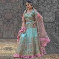 Imposing Turquoise Colored Party Wear Embroidered Net Lehenga Choli