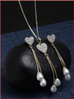 Myntra : Gold Plated White AD-Studded Heart Shaped pendant with Chain & Earring at ₹187