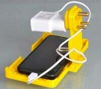 Mobile Stand Holder attached to 3 Pin Socket for all Mobiles.