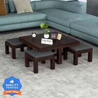 Take a look at this Taskwood Furniture Solid Wood Sheesham Wood Coffee Table With 4 Stools For Living Room, Guest Room Solid Wood Coffee Table on Flipkart
