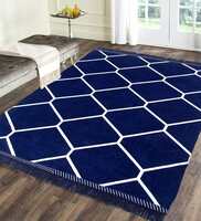 Pepperfry: Blue chenille abstract 5*7 feet machine made carpet by braids