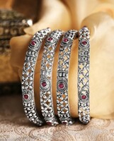 
Rubans Set Of 4 Oxidised Silver-Plated Pink Ruby Studded Handcrafted Bangles  on Myntra