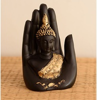 eCraftIndia Golden Handcrafted Palm Buddha Polyresin Showpiece (12.5 cm x 7.5 cm x 17.5 cm, Golden and Black) (Location Specific)