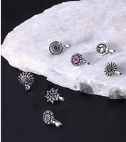 Yellow Chimes Silver Toned Set Of 7 Oxidised Clip-On Nose Pins