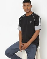Adidas: Upto 65% Off on Clothing
