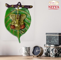 Flipkart Minutes - Shubhakart Nitya Ganesha Idol Paan Leaf Wall Hanging Showpiece (location specific)
