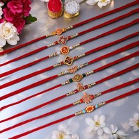 Designer Rakhi pack of 10 with Roli Chawal @94
