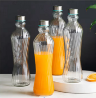 Home Centre Glass Marley Water Bottles (1L, Pack of 4, Transparent) 