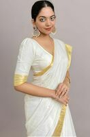 (Kerala saree)Versatile off-white cotton silk saree with golden lace border, suitable for casual, festive, and wedding events. 