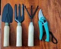 AGT Garden Tool Set Big Trowel, Hand Fork, Hand Rake & Pruner/Cutter for Gardening Garden Tool Kit on Flipkart